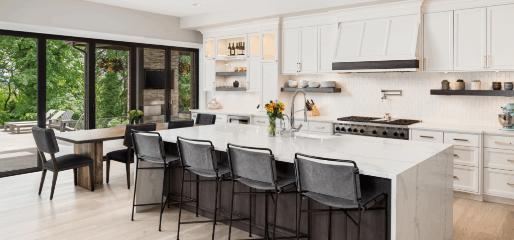 Modern residential kitchen maintained by cleaners.